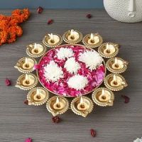 eCraftIndia Golden Metal Handcrafted Designer Urli with 13 Diyas - Elegant Home Decor Centerpiece,- Amazon